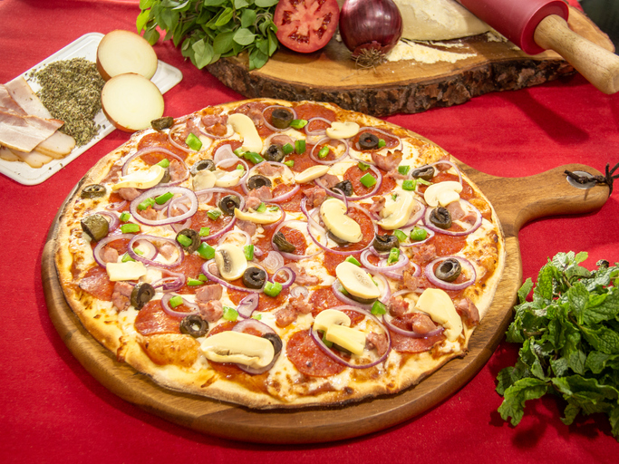 High Angle View Of Pizza On Table