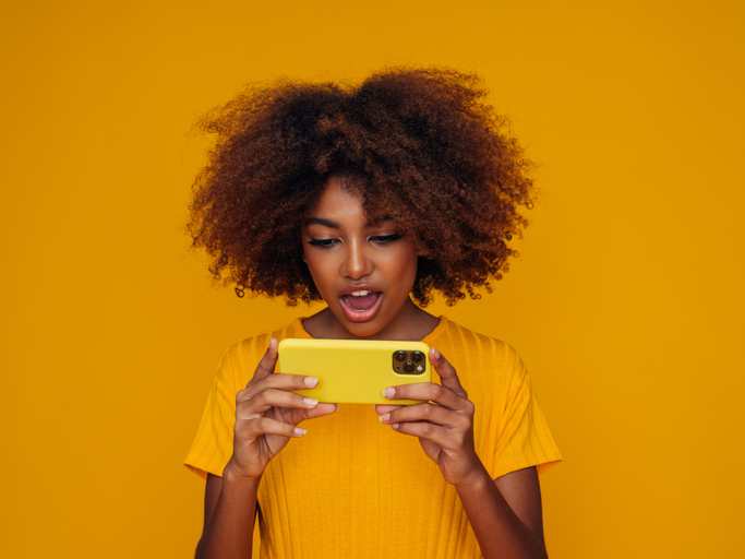 Woman holding a smart phone
